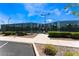 Outdoor tennis courts are surrounded by tall fencing and manicured landscaping with benches available for resting at 9812 Folsom Dr, Las Vegas, NV 89134