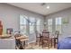 Bright dining area filled with natural light, perfect for Gathering meals and entertaining at 9822 Opal Bridge Ct, Las Vegas, NV 89178