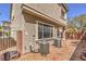 Exterior angle of home with gravel yard featuring two air conditioning units at 9822 Opal Bridge Ct, Las Vegas, NV 89178