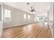 Spacious living room with hardwood floors, natural light, and plenty of room to gather at 10017 Snow Crest Pl, Las Vegas, NV 89134