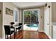 Cozy dining area with pool view, perfect for enjoying meals with a view at 10046 Floragold Ct, Las Vegas, NV 89147