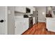Efficient kitchen with stainless steel appliances and white cabinetry at 10046 Floragold Ct, Las Vegas, NV 89147