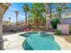 Inviting pool with a spa and landscaped surroundings, perfect for relaxation at 10046 Floragold Ct, Las Vegas, NV 89147