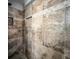 Detailed close-up of the shower featuring textured tiling, a built-in niche, and modern fixtures at 10046 Floragold Ct, Las Vegas, NV 89147