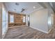 Stylish dining room featuring hardwood floors, plantation shutters, and a modern lighting at 10149 Terrastone Dr, Las Vegas, NV 89148