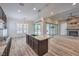 Well-appointed kitchen with granite island, stainless appliances, and open layout to living space at 10149 Terrastone Dr, Las Vegas, NV 89148