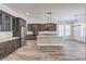 Gourmet kitchen featuring a large island, custom cabinetry, and stainless steel appliances at 10149 Terrastone Dr, Las Vegas, NV 89148