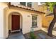 Charming front entrance featuring a decorative door, stone details, and a welcome mat at 10254 Martinsburg Ct, Las Vegas, NV 89183