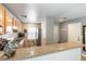Well-lit kitchen with a breakfast bar, modern appliances, and ample counter space at 10254 Martinsburg Ct, Las Vegas, NV 89183