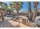 Resort-style backyard with a pool, spa, and fire pit, perfect for entertaining at 10310 Songsparrow Ct, Las Vegas, NV 89135