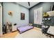 Bedroom featuring modern design with stylish decor and ample natural light, perfect for a or teenager at 10310 Songsparrow Ct, Las Vegas, NV 89135