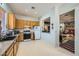 Functional kitchen featuring oak cabinets, stainless appliances, and an open layout at 10310 Songsparrow Ct, Las Vegas, NV 89135