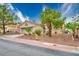 Attractive home featuring desert landscaping, and a tile roof at 10720 Sky Meadows Ave, Las Vegas, NV 89134