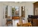 Cozy breakfast nook with natural light, adjacent to the kitchen, offering a pleasant spot for meals at 10720 Sky Meadows Ave, Las Vegas, NV 89134
