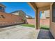 Backyard with pavers, artificial turf, brick wall, and covered patio at 10744 Yarmouth Bay Ct, Las Vegas, NV 89179