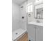 Modern bathroom featuring a stand-up shower with glass door and sleek vanity at 1121 W Monroe Ave, Las Vegas, NV 89106