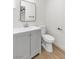 Bathroom featuring a gray vanity with modern fixtures at 1121 W Monroe Ave, Las Vegas, NV 89106
