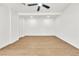 Bright, spacious bedroom with a ceiling fan and a light wood flooring at 1121 W Monroe Ave, Las Vegas, NV 89106