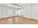 Spacious bedroom with a ceiling fan, two closets, and barn door to ensuite bathroom at 1121 W Monroe Ave, Las Vegas, NV 89106