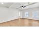 Bright, spacious bedroom with two windows and a light wood flooring at 1121 W Monroe Ave, Las Vegas, NV 89106
