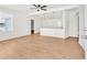 Open concept living room with wood-look floors and natural light at 1121 W Monroe Ave, Las Vegas, NV 89106
