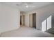 Neutral bedroom showcasing a closet and an entrance to another room at 1506 Camino Summit Ave, Henderson, NV 89012