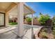 Inviting outdoor patio space with a covered area and garden at 1506 Camino Summit Ave, Henderson, NV 89012