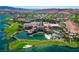 Luxurious resort featuring a sprawling golf course, multiple pools, and picturesque lake views at 1596 Pleasant Bay Ct, Henderson, NV 89011