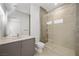 Bright bathroom with a walk-in shower and modern vanity at 1596 Pleasant Bay Ct, Henderson, NV 89011