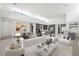 Spacious open-concept living room featuring modern decor, recessed lighting, and views into the open kitchen at 1596 Pleasant Bay Ct, Henderson, NV 89011