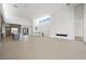 Bright open living area featuring a modern design, fireplace, and open access to the kitchen at 1596 Pleasant Bay Ct, Henderson, NV 89011