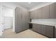 Large pantry with ample cabinet and countertop space, plus built-in wine fridge at 1596 Pleasant Bay Ct, Henderson, NV 89011