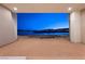 Unfinished patio with lake view, revealing serene vistas, awaiting personalized design at 1596 Pleasant Bay Ct, Henderson, NV 89011
