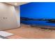 Unfinished patio showcasing lake view, a tranquil backdrop for future outdoor enjoyment at 1596 Pleasant Bay Ct, Henderson, NV 89011