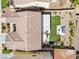 An aerial view of the home and its backyard with an outdoor patio at 1604 Patrick Thomas Ct, North Las Vegas, NV 89086