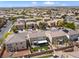 Overhead view of neighborhood homes with landscaped yards and neighborhood streets at 1604 Patrick Thomas Ct, North Las Vegas, NV 89086