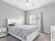 Comfortable bedroom with bright natural light and neutral decor at 1604 Patrick Thomas Ct, North Las Vegas, NV 89086