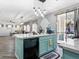 Well-appointed kitchen with an island, a dishwasher, and backyard views through sliding glass doors at 1604 Patrick Thomas Ct, North Las Vegas, NV 89086