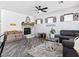 Cozy living area featuring a fireplace, comfortable seating, and stylish decor at 1604 Patrick Thomas Ct, North Las Vegas, NV 89086
