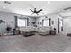 Spacious living area with plush carpeting, ample seating, and stylish decor at 1604 Patrick Thomas Ct, North Las Vegas, NV 89086