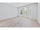 Bright bedroom features wood-look flooring, bay window, white trim and shutters at 2029 Poppywood Ave, Henderson, NV 89012