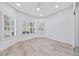 Bright bedroom with large windows providing abundant natural light, complemented by modern flooring at 2029 Poppywood Ave, Henderson, NV 89012