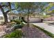 Charming single-story home featuring a two car garage and a beautifully landscaped front yard at 2029 Poppywood Ave, Henderson, NV 89012