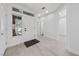 Bright foyer boasting wood-style flooring, a sidelight, and neutral walls at 2029 Poppywood Ave, Henderson, NV 89012