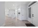 Inviting foyer showcasing neutral walls, tile flooring, and an open floorplan at 2029 Poppywood Ave, Henderson, NV 89012