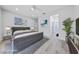 Stylish main bedroom with neutral decor, en-suite bathroom, and ample natural light at 2029 Poppywood Ave, Henderson, NV 89012