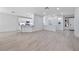 Bright open floorplan with wood-style flooring, white walls, and lots of space at 2029 Poppywood Ave, Henderson, NV 89012