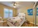 Inviting bedroom features hardwood floors and natural light creating a cozy retreat at 2050 W Warm Springs Rd # 3211, Henderson, NV 89014