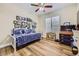 Bright and inviting bedroom features hardwood floors and a cozy ambiance at 2050 W Warm Springs Rd # 3211, Henderson, NV 89014