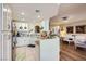 Efficient white kitchen opens to the living room, ideal for entertaining and everyday living at 2050 W Warm Springs Rd # 3211, Henderson, NV 89014